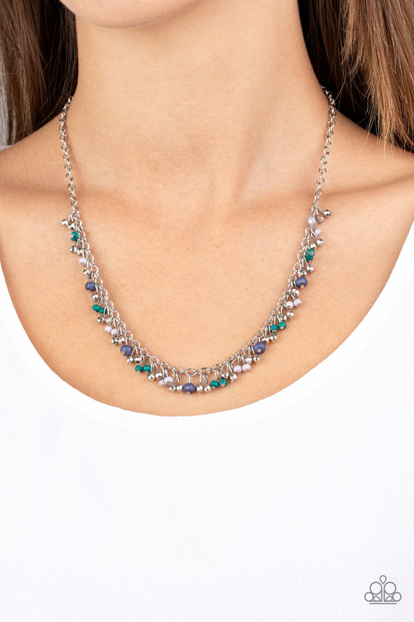 Blue jewelry featured in the boutique's existing storefront